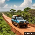 기니비사우에서 운전과 차량 렌트 가이드 - A rugged 4x4 SUV driving on a dusty, uneven dirt road in rural Guinea-Bissau, surrounded by lush gre...
